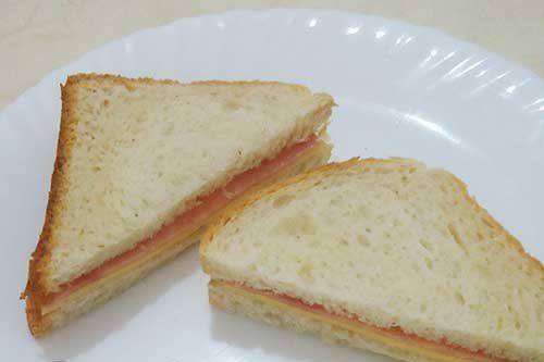 Рецепт Сэндвичи с ветчиной и сыром  шаг-2